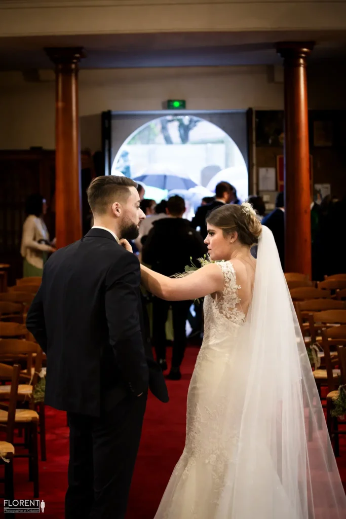mariage sortie eglise la marie reajuste cravatte marie florent studio boulogne sur mer lille le touquet paris saint omer